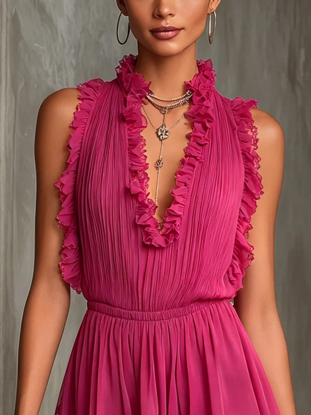 Alina Chiffongjumpsuit Med Plisserad Design Och Fuchsiarandig Kant