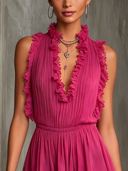 Alina Chiffongjumpsuit Med Plisserad Design Och Fuchsiarandig Kant